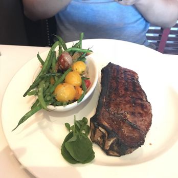 The Capital Grille - Rib eye with green bean salad - Steakhouses Near Me - Phoenix, Arizona
