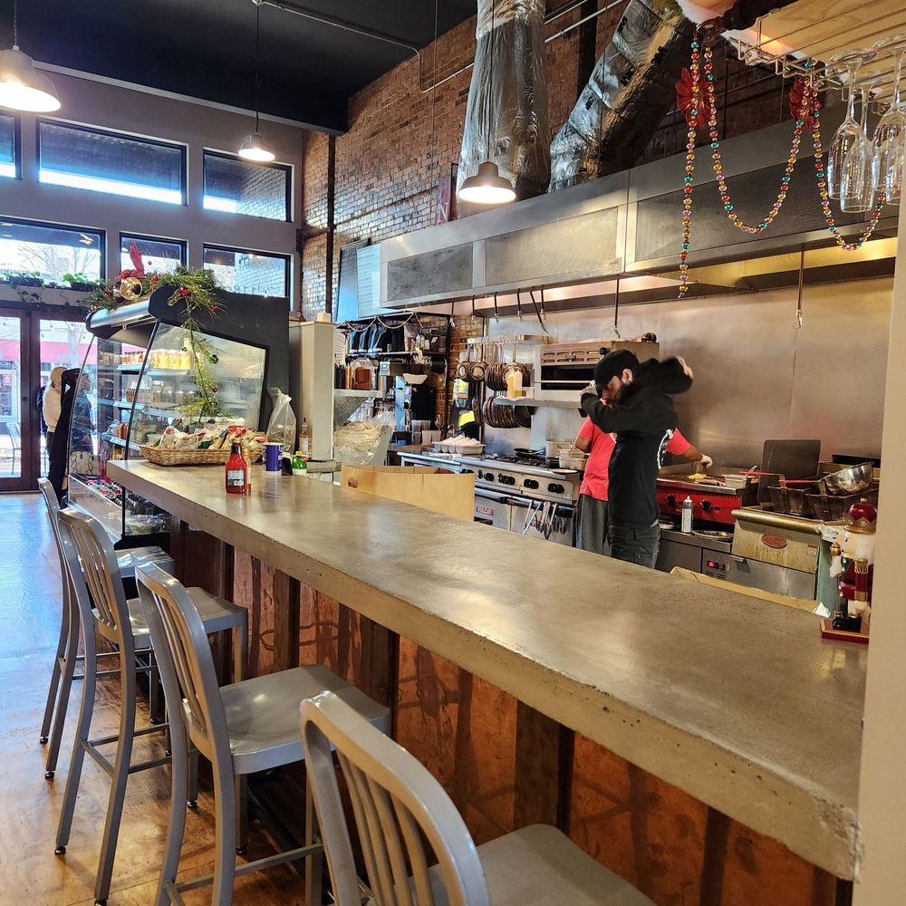 High Rise Bakery - Bar dining to watch the cooks - Coffee & Tea Near Me - Jefferson City, Missouri High Rise Bakery - Bar dining to watch the cooks - Coffee & Tea Near Me - Jefferson City, Missouri