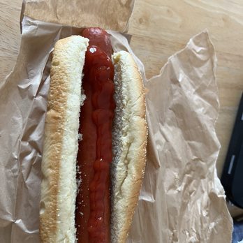 Costco - Foot long all beef hotdog with a little ketchup. - Department Stores Near Me - Alexandria, Virginia