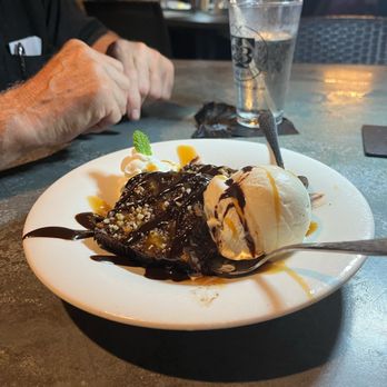 Table 23 - Flourless Chocolate Brownie with Vanniall Ice Cream. - New American Near Me - Tallahassee, Florida