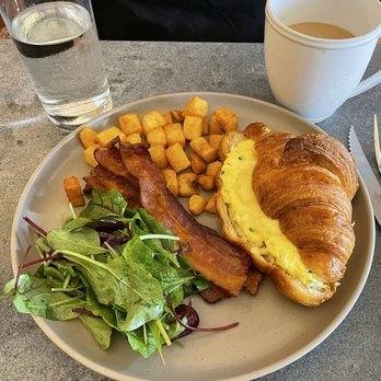 CIA Bakery Cafe - Egg Croissant, Thick-Cut Bacon, House Potatoes, Petite Salade, Coffee. - Coffee & Tea Near Me - San Antonio, Texas