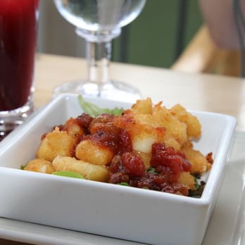 Simon Pearce - Cheddar bites with tomato chutney - New American Near Me - Quechee, Vermont Simon Pearce - Cheddar bites with tomato chutney - New American Near Me - Quechee, Vermont