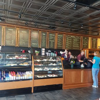 Uncommon Grounds - Check out the front counter with all the goodies to the left! The menu board has a lot of character and is in pristine order. - Coffee & Tea Near Me - Clifton Park, New York Uncommon Grounds - Check out the front counter with all the goodies to the left! The menu board has a lot of character and is in pristine order. - Coffee & Tea Near Me - Clifton Park, New York