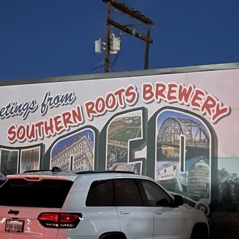 Southern Roots Brewing Company - a white jeep parked in front of a building - Brewpubs Near Me - Waco, Texas Southern Roots Brewing Company - a white jeep parked in front of a building - Brewpubs Near Me - Waco, Texas