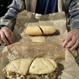 Vegan Philly cheese steak (nearest sando) and normal Philly cheese steak (farther one). Vegan Philly cheese steak (nearest sando) and normal Philly cheese steak (farther one).