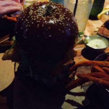 Earls Kitchen + Bar - The onion ring burger - Canadian (New) Near Me - Toronto, Ontario Earls Kitchen + Bar - The onion ring burger - Canadian (New) Near Me - Toronto, Ontario