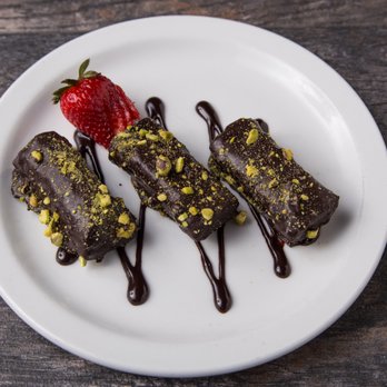 Pita Jungle - Chocolate Dipped Walnut Baklawa Rolls - Mediterranean Near Me - Phoenix, Arizona Pita Jungle - Chocolate Dipped Walnut Baklawa Rolls - Mediterranean Near Me - Phoenix, Arizona