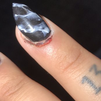 Hot Tips Nail Lounge - Just one of my fingers and how butchered it was - Nail Salons Near Me - Rockaway, New Jersey