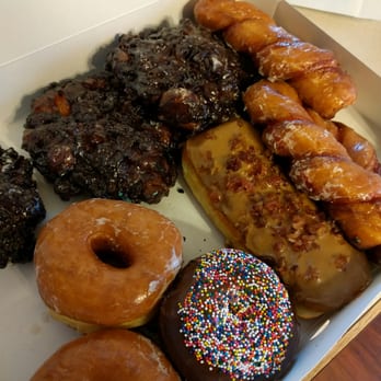 Ambrosia Donuts - The amazing dozen with a few donuts missing :) - Donuts Near Me - Ankeny, Iowa Ambrosia Donuts - The amazing dozen with a few donuts missing :) - Donuts Near Me - Ankeny, Iowa