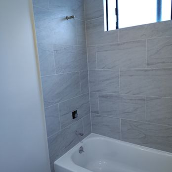 Lenny's Multipurpose Services - Tile finish and caulked in - Drywall Installation & Repair Near Me