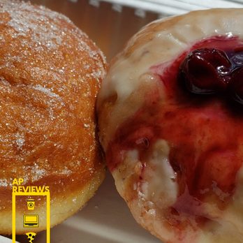 Darkside Donuts - a close up of a donut with a berry topping - Donuts Near Me - Saskatoon, Saskatchewan Darkside Donuts - a close up of a donut with a berry topping - Donuts Near Me - Saskatoon, Saskatchewan