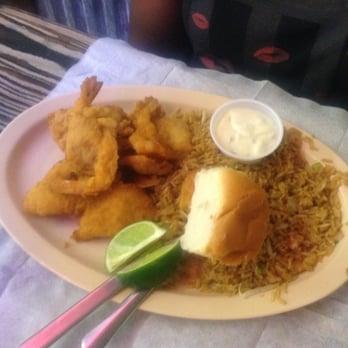Mambo Seafood - Fish plate w/shrimp and famous Mambo rice! Ooh.. talk about something that is so GUD! - Seafood Near Me - Houston, Texas