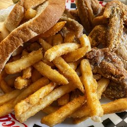 Delicious wings and fries Delicious wings and fries