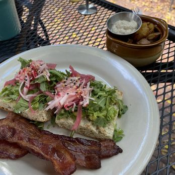 The Mud House - Avocado toast + side of bacon and side of spuds with aioli. - Coffee & Tea Near Me - Saint Louis, Missouri