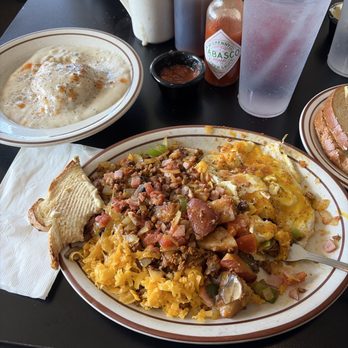 The Green Valley Cafe - Breakfast skillet with ham and chorizo and a side of biscuits and gravy. - Breakfast & Brunch Near Me - Hanford, California The Green Valley Cafe - Breakfast skillet with ham and chorizo and a side of biscuits and gravy. - Breakfast & Brunch Near Me - Hanford, California