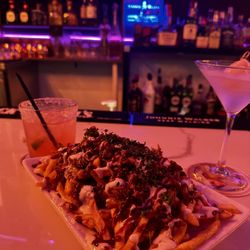 G6 Lounge & Restaurant - Carne asada fries the Paloma and lychee martini
