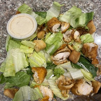 Crazy D's Hot Chicken - What Caesar Salad looked like before asked for extra Lettuce/ got with Chicken Tender - Chicken Shop Near Me - Reno, Nevada Crazy D's Hot Chicken - What Caesar Salad looked like before asked for extra Lettuce/ got with Chicken Tender - Chicken Shop Near Me - Reno, Nevada