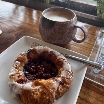Thirsty Cafe Coffee Bar - A cherry pastry and a brown sugar cardamom oat milk latte - Coffee & Tea Near Me - Cascade Locks, Oregon Thirsty Cafe Coffee Bar - A cherry pastry and a brown sugar cardamom oat milk latte - Coffee & Tea Near Me - Cascade Locks, Oregon