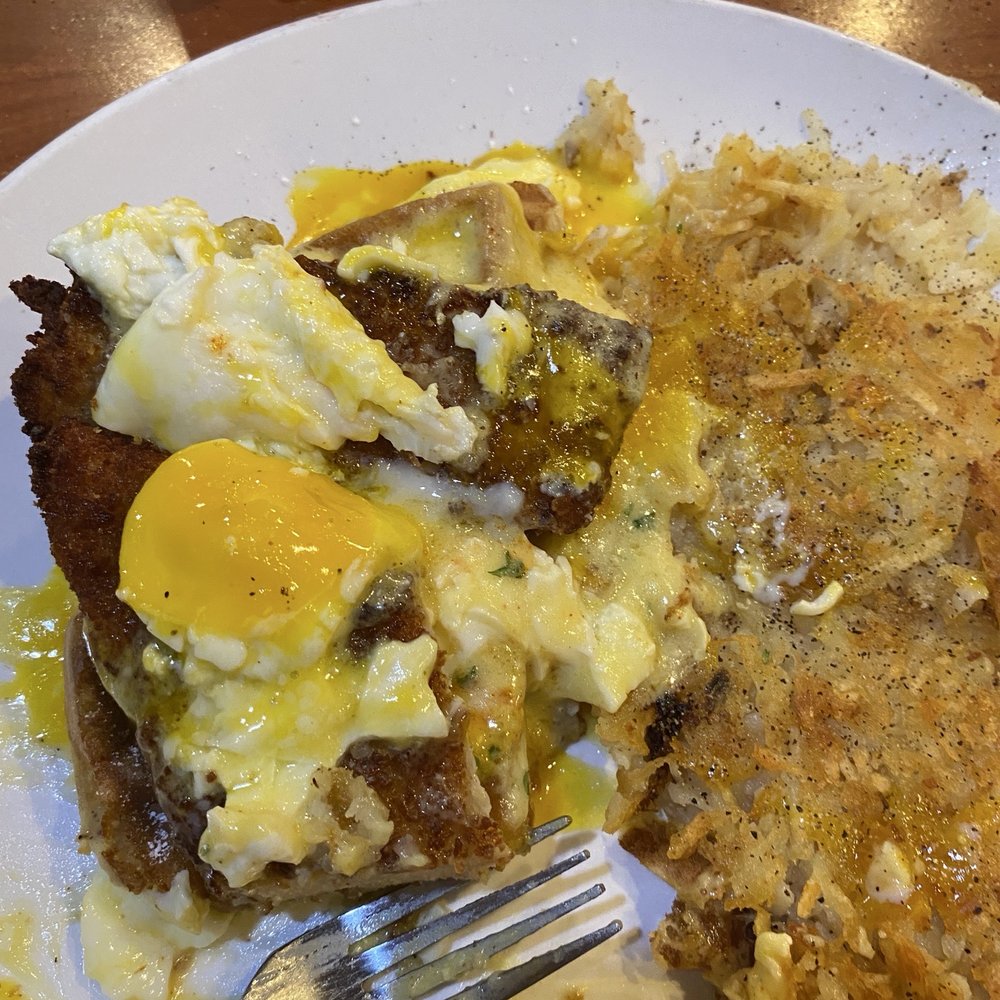 Broken Yolk Cafe - Eggs, Benedict on top of chicken and waffles - Breakfast & Brunch Near Me - Mesa, Arizona Broken Yolk Cafe - Eggs, Benedict on top of chicken and waffles - Breakfast & Brunch Near Me - Mesa, Arizona