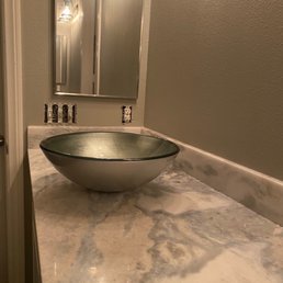 My restroom with pre-fab countertop. One of 5 others which are currently under installation. My restroom with pre-fab countertop. One of 5 others which are currently under installation.