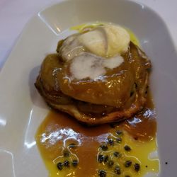 A wonderful dinner finished with tiramisu and an apple and passion fruit tart...