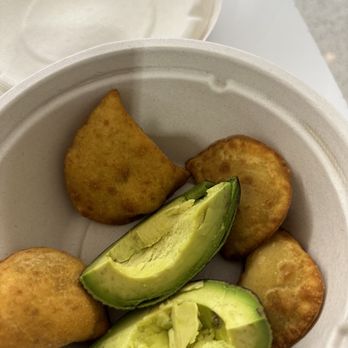 Carribean Kitchen - a bowl of food with avocado - Caribbean Near Me - Queens, New York Carribean Kitchen - a bowl of food with avocado - Caribbean Near Me - Queens, New York