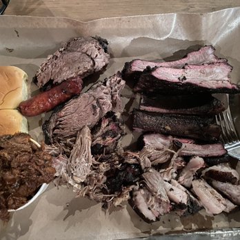 Fette Sau - 1/2 lb Beef Brisket, 1/2 lb Pulled Pork, 1/2 lb Pork Belly, 1 lb St. Louis Ribs, 1 link Spicy Pork Sausage, Burnt End Baked Beans and rolls - Barbeque Near Me - Brooklyn, New York Fette Sau - 1/2 lb Beef Brisket, 1/2 lb Pulled Pork, 1/2 lb Pork Belly, 1 lb St. Louis Ribs, 1 link Spicy Pork Sausage, Burnt End Baked Beans and rolls - Barbeque Near Me - Brooklyn, New York