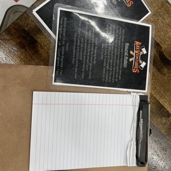 Axe Ventures LA - Pen, notepad, games - Axe Throwing Near Me - Los Angeles, California