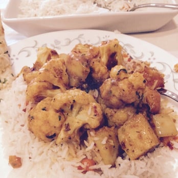 Flavors - Canandaigua - Goni Alu. Potatoes and cauliflower in a seasoned tomato sauce. Yum - Indian Near Me - Canandaigua, New York Flavors - Canandaigua - Goni Alu. Potatoes and cauliflower in a seasoned tomato sauce. Yum - Indian Near Me - Canandaigua, New York