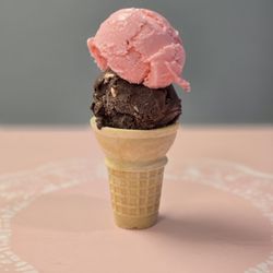 Three P's Ice Cream - Two scoops of ice cream on a sugar cone