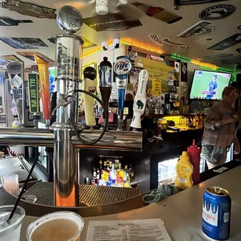 AC Tap - Bar seats with ceiling art - American Near Me - Baileys Harbor, Wisconsin AC Tap - Bar seats with ceiling art - American Near Me - Baileys Harbor, Wisconsin
