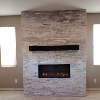 Markitant Construction - Fireplace remodeling. Stone insulation - Handyman Near Me - Littleton, Colorado