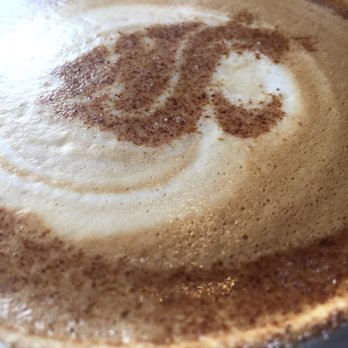 Zoe Coffee & Kitchen - Coffee art on a for here latte! - Coffee & Tea Near Me - Pullman, Washington