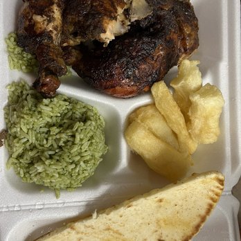 Yummy Pollo - Dark half chicken with yucca fries and lime cilantro rice and pita. Traditionally prepared! - Peruvian Near Me - Louisville, Kentucky