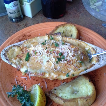 Squid Lips - Seafood Lasagne - Seafood Near Me - Sebastian, Florida Squid Lips - Seafood Lasagne - Seafood Near Me - Sebastian, Florida