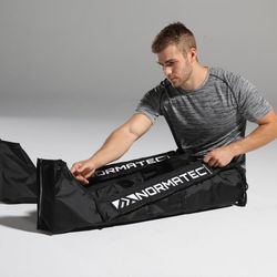 CryoStretch Roswell - NormaTec recovery equipment helps you bounce back from your workout faster by using compressed air to massage your limbs and mobilize fluid.