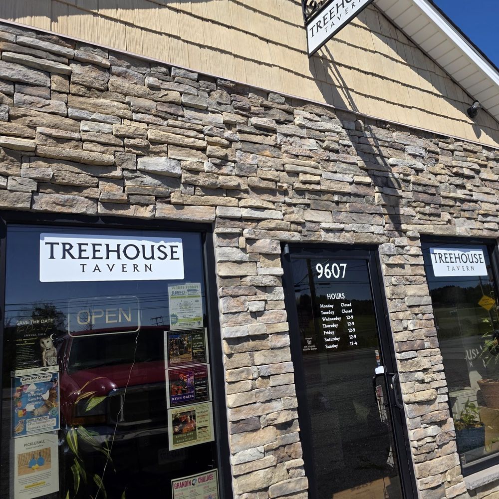 Treehouse Tavern - The entrance to the restaurant with their Hours of Operation posted on the front door. - Bars Near Me - Bent Mountain, Virginia