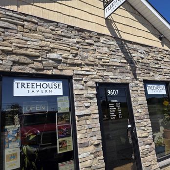 Treehouse Tavern - The entrance to the restaurant with their Hours of Operation posted on the front door. - Bars Near Me - Bent Mountain, Virginia