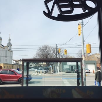 Super Burger - a view of a street through a window - Hot Dogs Near Me - Etobicoke, Ontario