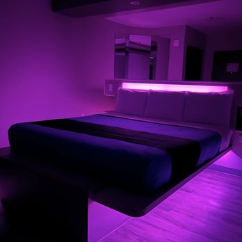 Crystal Inn - Room picture with Royal Purple LED lighting. Our rooms have LED lightning that can be controlled by the guest! - Hotels Near Me - Houston, Texas