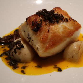 STK Steakhouse Chicago - Chilean sea bass with black truffle paste and orange mustard sauce. - Steakhouses Near Me - Chicago, Illinois