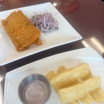 Emelina's 3 - Yucca fries and a chicken empanada (skip this, it's not very good) - Peruvian Near Me - San José, California Emelina's 3 - Yucca fries and a chicken empanada (skip this, it's not very good) - Peruvian Near Me - San José, California