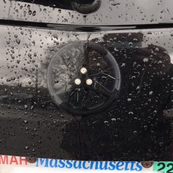 Perfection Towing - Car sitting on the tow lot. Back badge had been popped off with a screwdriver.