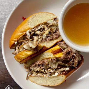 Olives - Braised Short Rib French Dip
Braised beef short ribs * Swiss cheese * Fried onions * Horsey cream * Beef jus * Hoagie bun - New American Near Me - Grand Rapids, Michigan