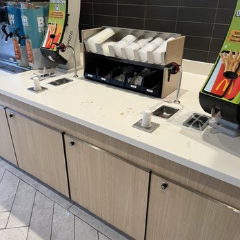 McDonald's - And overall picture in front of the condiments lids and the napkins - Fast Food Near Me - Waverly, Nebraska