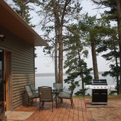Tamarac Resort & Campground - Propane grill with deck overlooking lake with grassy area for lawn games