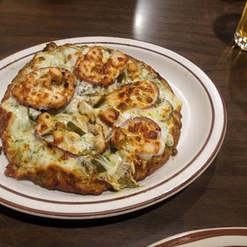 The Gusher - Personal pizza with Pesto sauce, grilled chicken, jalapeños and onions - Pizza Near Me - West Yellowstone, Montana The Gusher - Personal pizza with Pesto sauce, grilled chicken, jalapeños and onions - Pizza Near Me - West Yellowstone, Montana