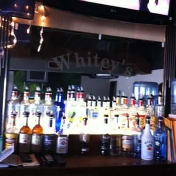 Whitey's Tip Top Inn - a bar with bottles of alcohol - Bars Near Me - Peoria, Illinois Whitey's Tip Top Inn - a bar with bottles of alcohol - Bars Near Me - Peoria, Illinois