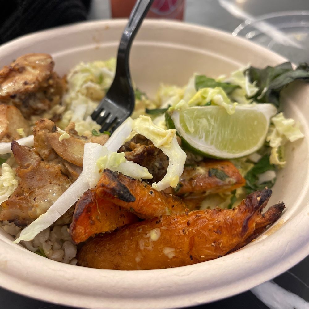 Dig Inn - a bowl of food with a fork in it - New American Near Me - Brooklyn, New York Dig Inn - a bowl of food with a fork in it - New American Near Me - Brooklyn, New York