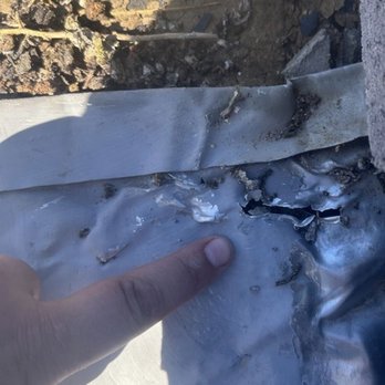 1Solar Roofing - Large gash in the protective underlayment beneath the 1Solar array. - Solar Installation Near Me 1Solar Roofing - Large gash in the protective underlayment beneath the 1Solar array. - Solar Installation Near Me